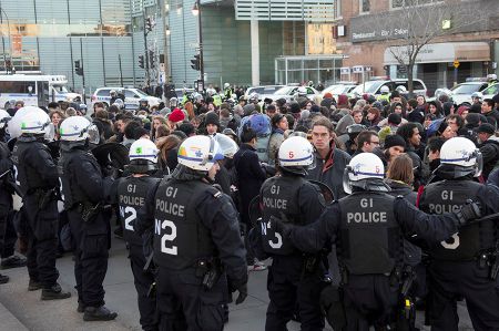 Montreal police kettle protesters during a demonstration against bylaw P-6 at Place Émilie-Gammelin in 2013. Photo: Darren Ell.