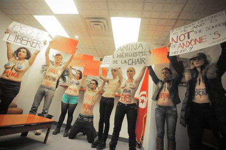 Femen Quebec rallied for a short 15 minutes to avoid being pinned for indecent exposure by police. Photo by Francis William Rhéaume