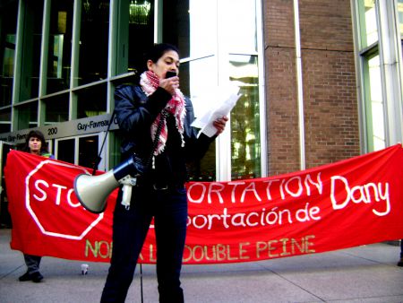 Activists protest outside of Complex Guy Favreau, where Villanueva’s deportation hearing took place.