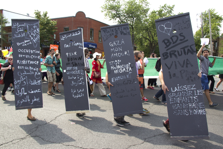 Protesters holding an imitation Apartheid Wall - July 19 