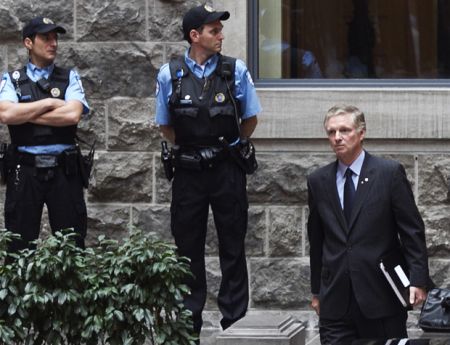 Paul Desmarais Jr., leaving a shareholders meeting of Power Corporation during student protests, May 15, 2012