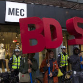 Protesters in front of  the Mountain Equipment Co-op