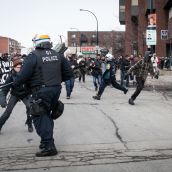 Things had barely got underway before Riot Police moved in to block protesters.