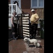 Marie-Reine Babin and Jacques Bessette try to deal with flood damage.